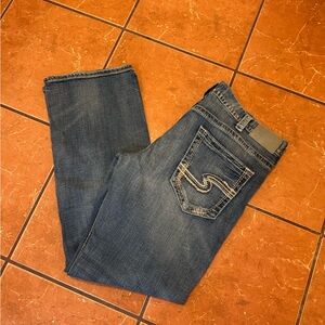 Silver Jeans Men’s Blue Boot Cut Denim with Embroidered Back Pocket